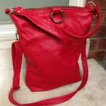 Red leather bag , fold over bag , l..