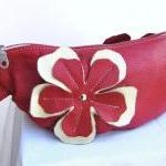 Red Leather clutch with flower appl..