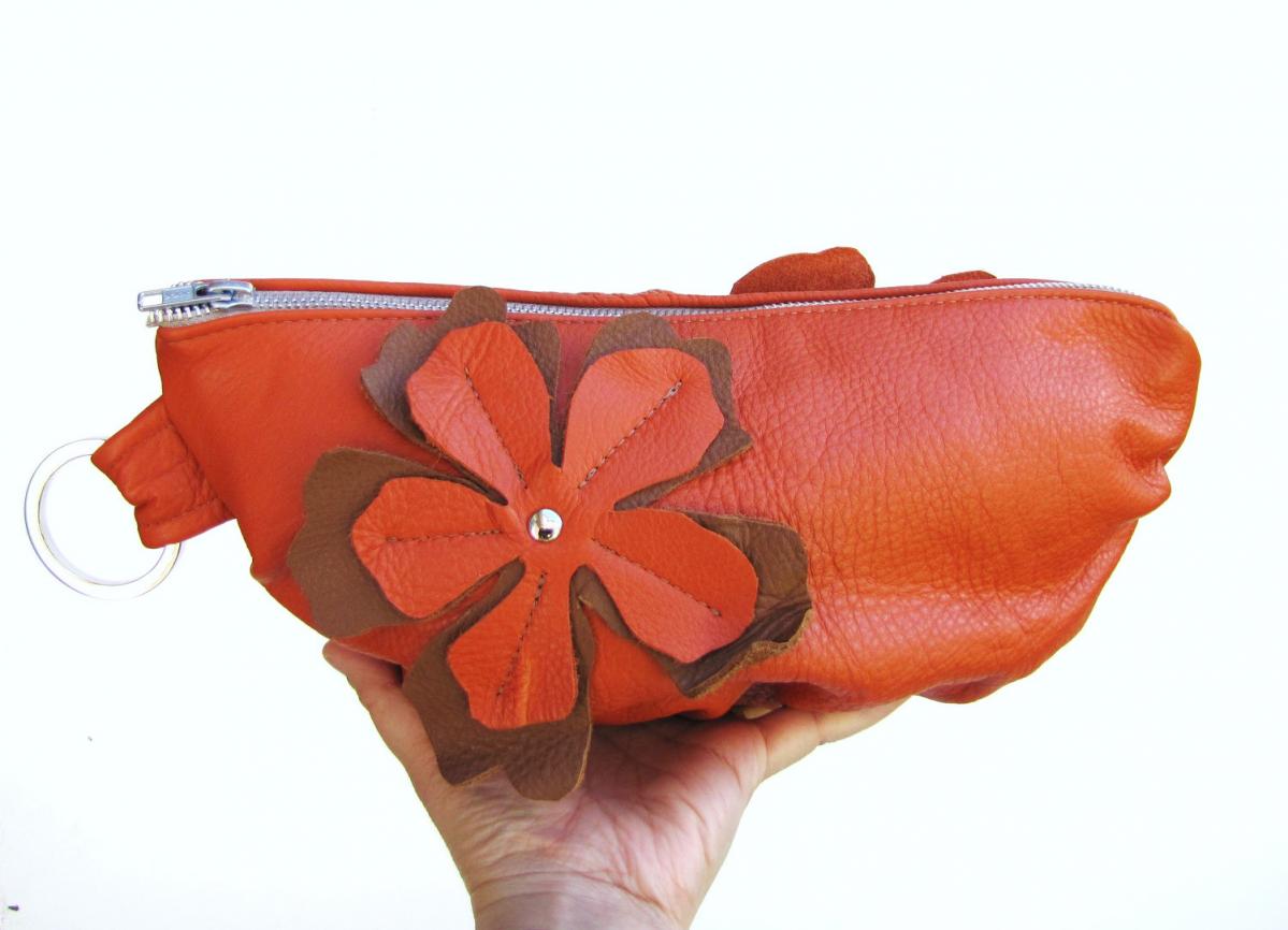 Medium sized orange Leather Clutch with flower applique on both sides