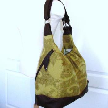 Green/gold vines canvas convertible bag w/ leather straps and base